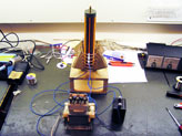The tesla coil, spark gap, capacitor, and transformer